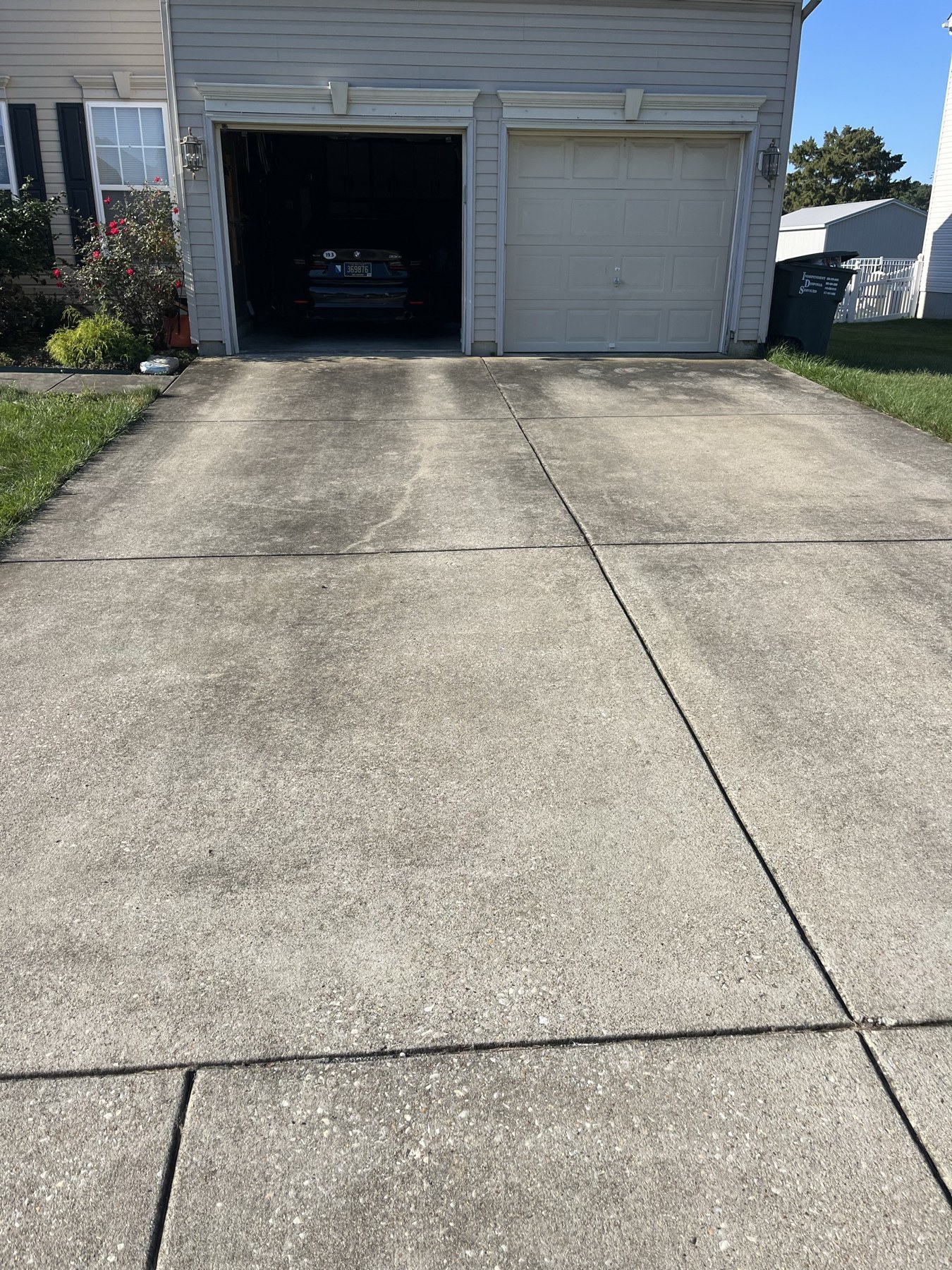 Concrete driveway before power washing